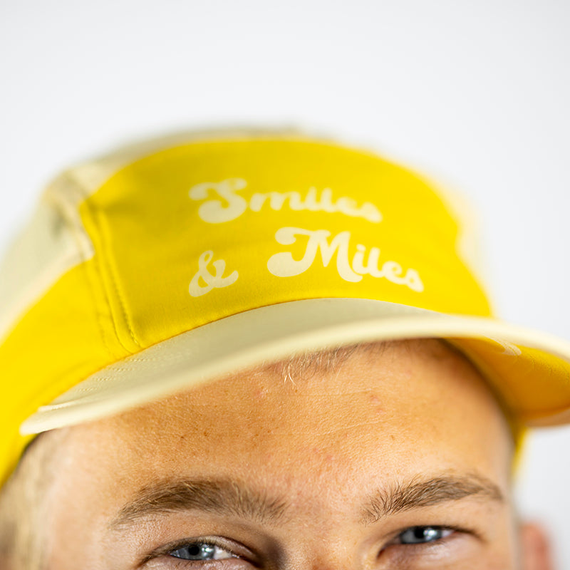 The 'Smiles & Miles' Yellow Camper Hat