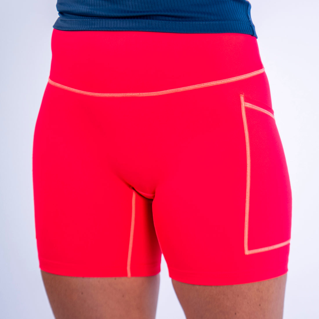 Coral Seamless Mid-Thigh Run Shorts