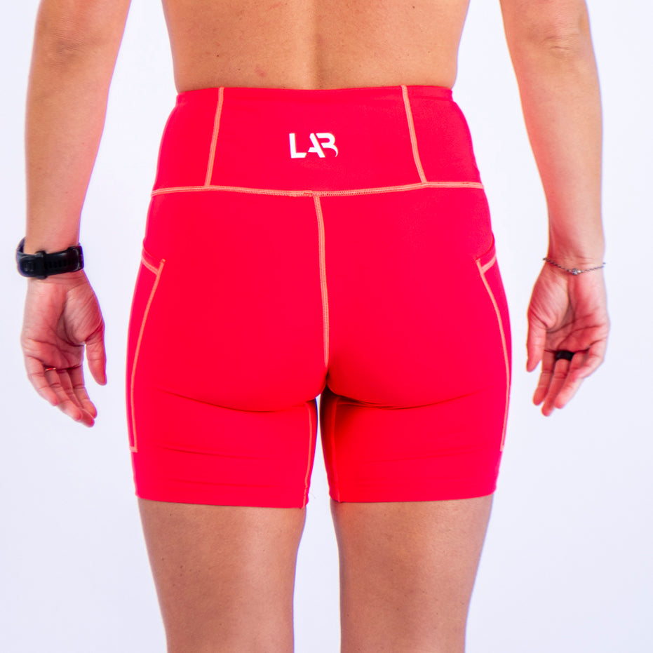 Coral Seamless Mid-Thigh Run Shorts