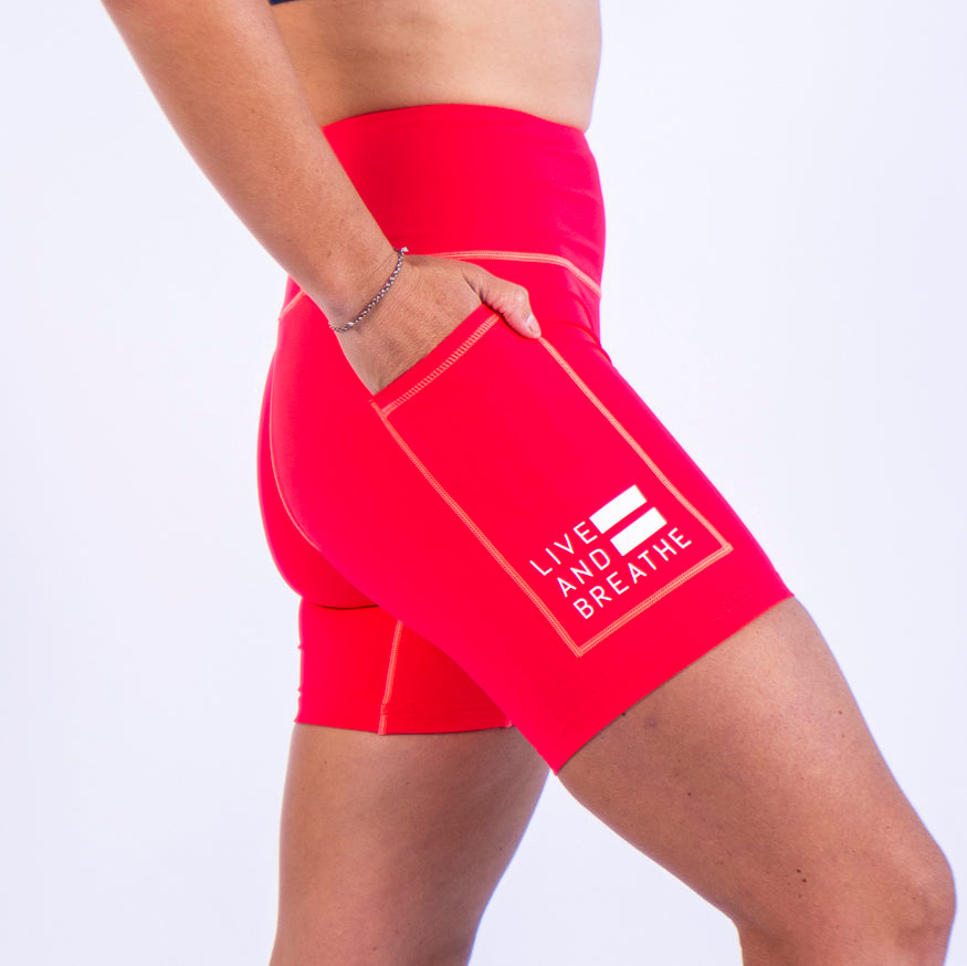 Coral Seamless Mid-Thigh Run Shorts
