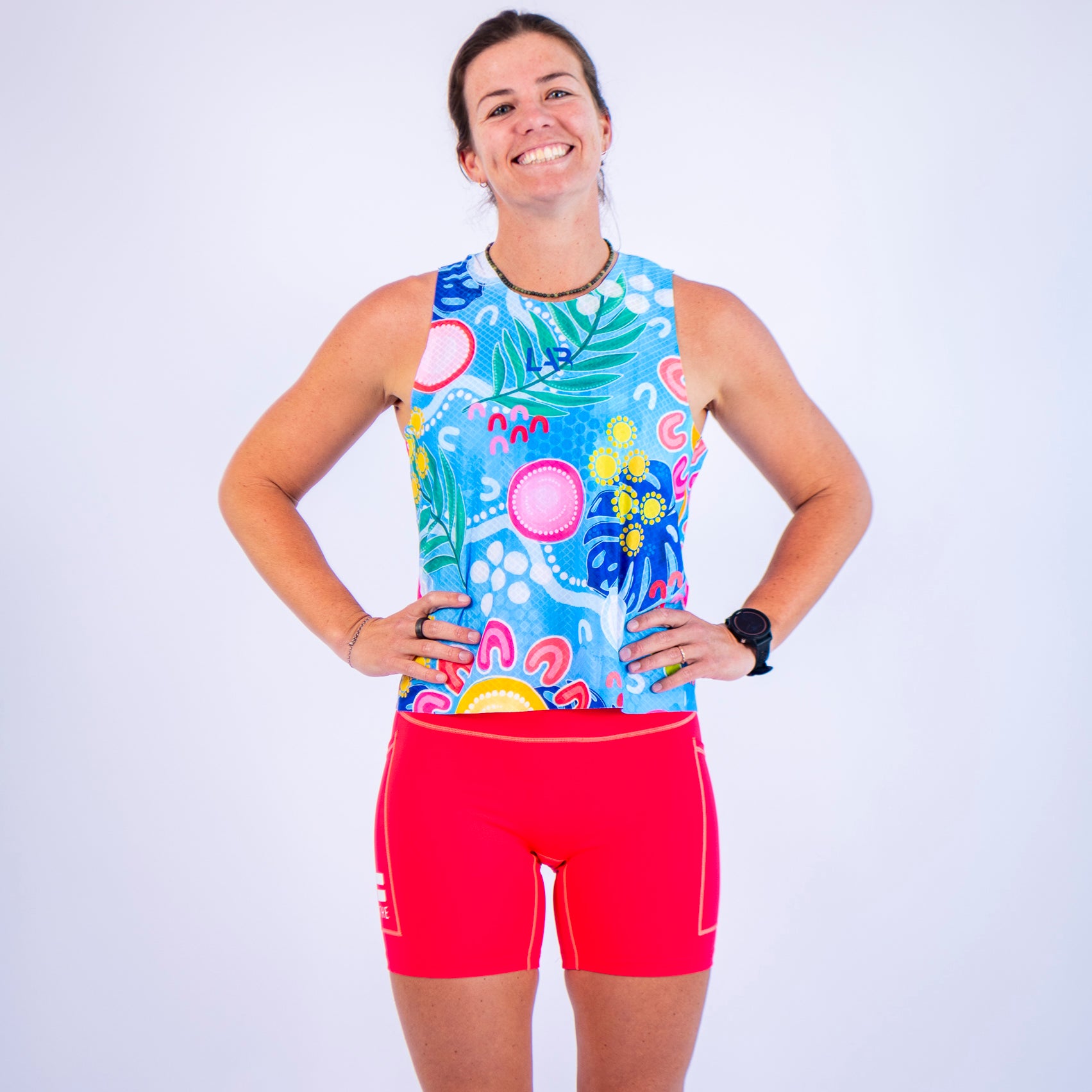 Coral Seamless Mid-Thigh Run Shorts